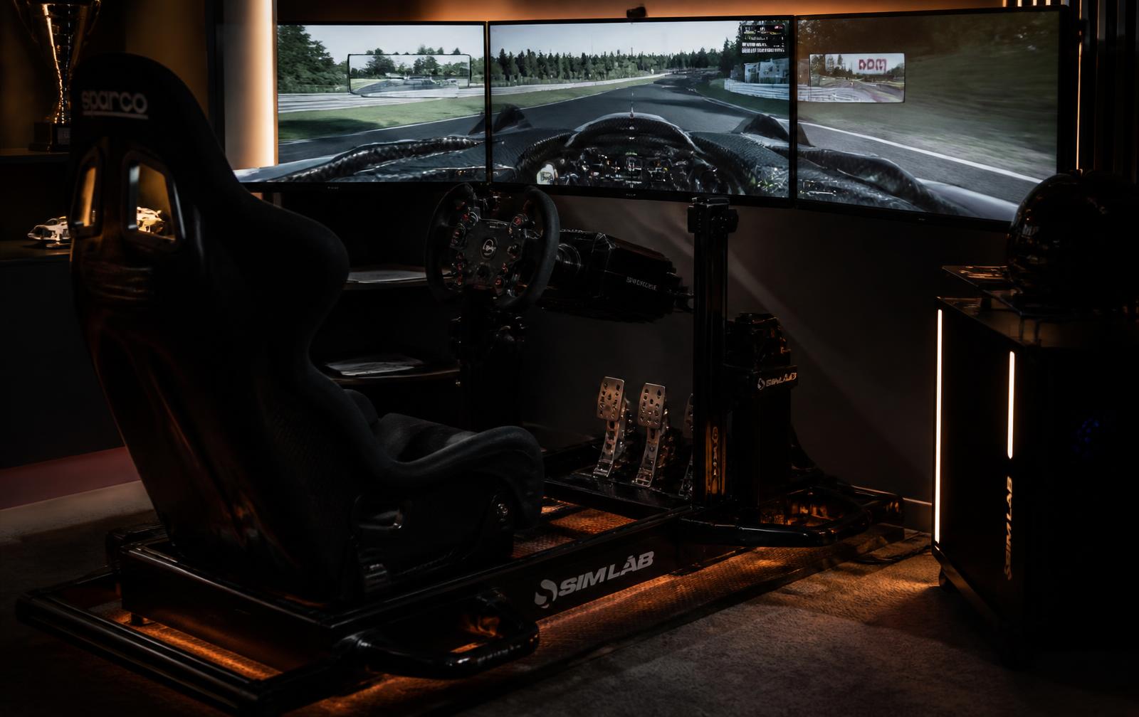 Home racing simulator with direct-drive wheel and triple screens